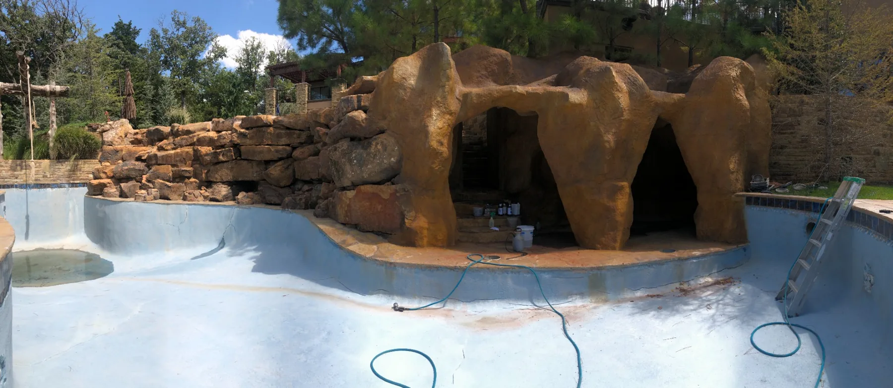 Large custom carved concrete pool cave