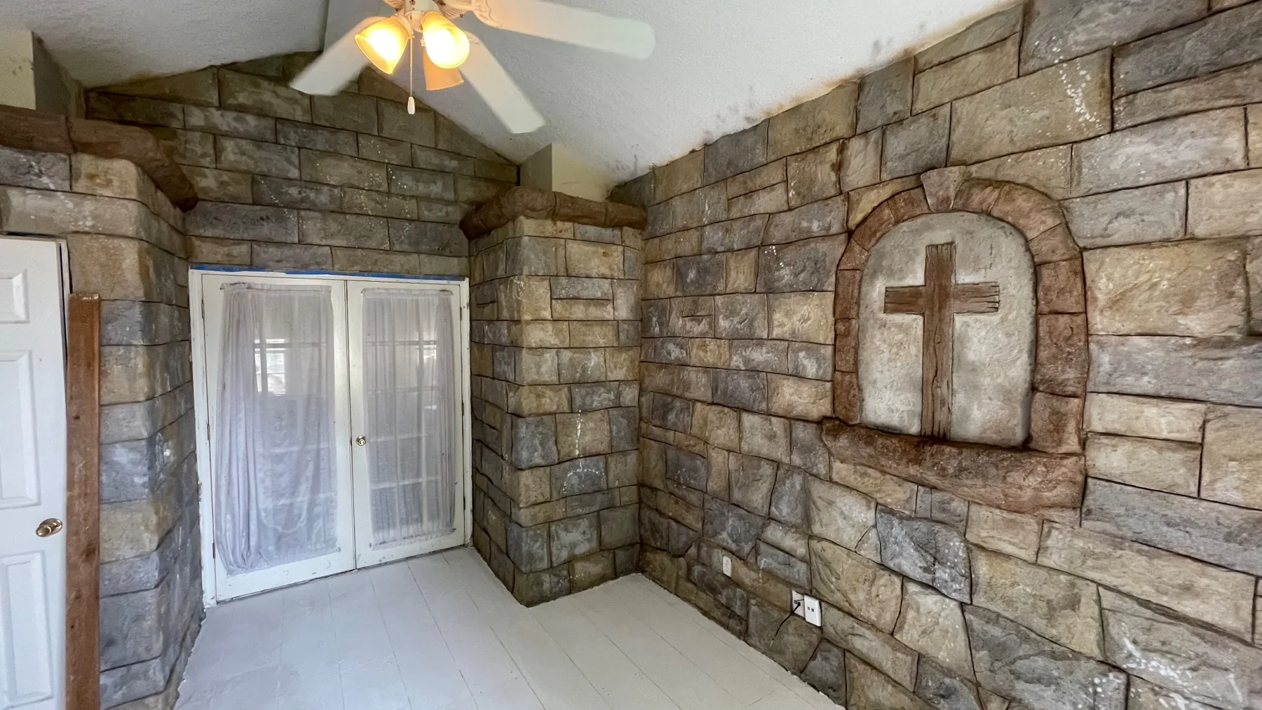 Hand-carved and colored concrete stone wall