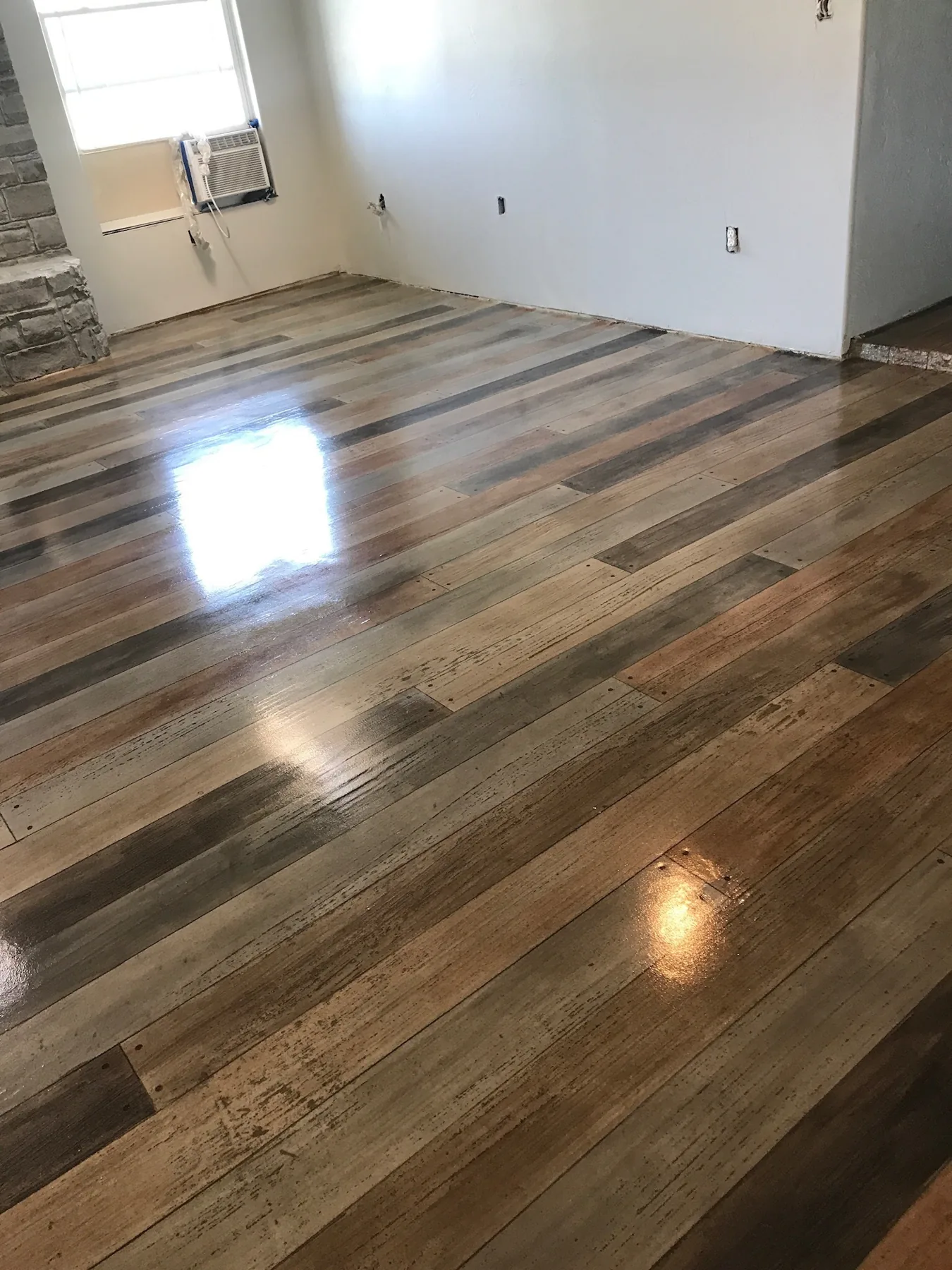 Multi-tone wood-look concrete floor