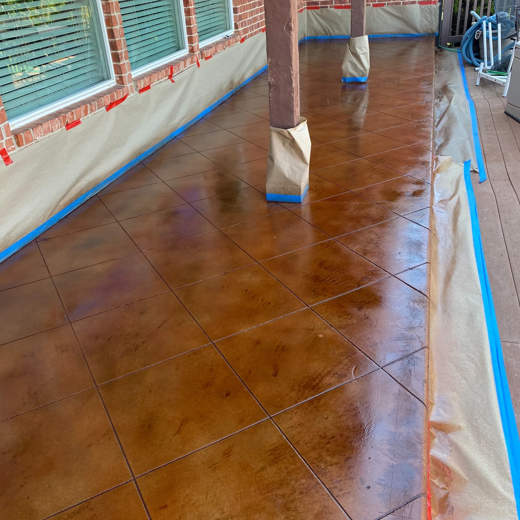 Stained and scored decorative concrete patio