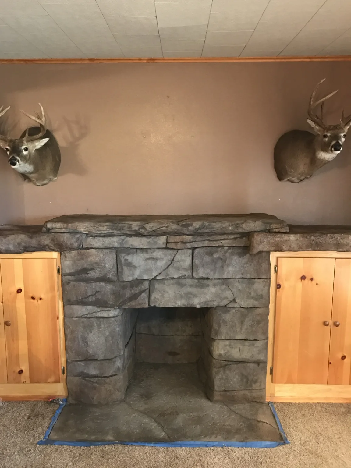 Custom carved stone fireplace